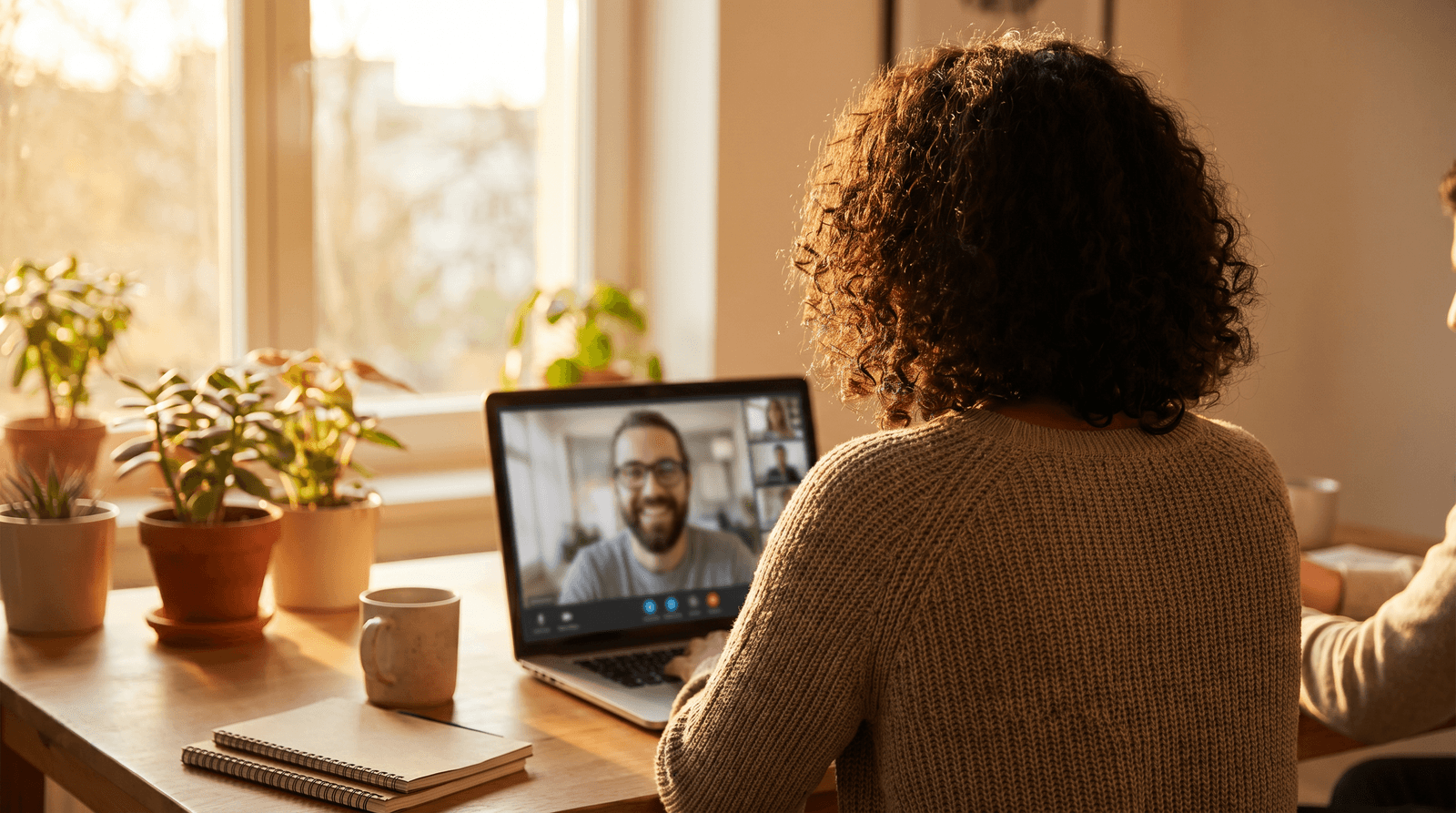 Two professionals on a video call, collaborating in real time.